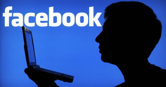 cybersecurity bill (ILLUSTRATION) An illustration dated 23 January 2012 shows the silhouette of a man in front of a screen with the logo of the online network Facebook in Hanover, Germany. Facebook is being criticized again and again for data privacy. Most recently, Facebook has introduced the Timeline, with which Facebook users can share moments of the entire life with other internet users online. Photo: Julian Stratenschulte -ALLIANCE-INFOPHOTO